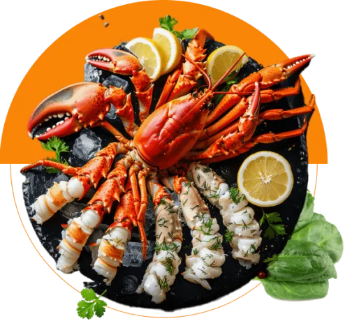 A luxurious seafood platter from Voro Food, showcasing a whole cooked lobster, fresh lemon, and garnished seafood tails on a slate plate.