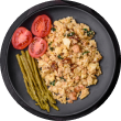 A top-down view of a healthy Voro Food dish, featuring a veggie scramble or quinoa served with fresh tomatoes and asparagus on a dark plate.