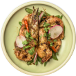 A top-down view of a fresh grilled shrimp dish from Voro Food, garnished with cilantro and radishes on a modern ceramic plate.
