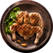 A top-down view of a whole grilled spatchcock chicken from Voro Food, served with fresh greens on a rustic metal plate.